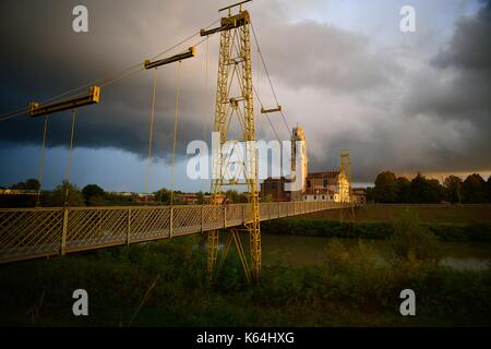 Veneto, Italy. 11th Sept, 2017. The bad weather continues in Veneto. The region is flagged by strong thunderstorms. In the picture the bridge on the Brenta river and the church of Torre, a suburb of Padua. Credit: Ferdinando Piezzi/Alamy Live News Stock Photo