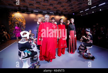 London, UK. 11th Sep, 2017. Seamstresses and models perform during the 'weaving a dream' fashion show celebrating the 45th anniversary of the establishment of the ambassadorial diplomatic relations between China and Britain in London Sept. 11, 2017. Credit: Han Yan/Xinhua/Alamy Live News Stock Photo