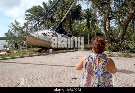 Miami, Florida, USA. 11th Sep, 2017. A sailboat came to rest near a parking lot off of Dinner Key in Miami after Hurricane Irma. Credit: Sun-Sentinel/ZUMA Wire/Alamy Live News Stock Photo