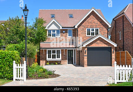 New home for sale detached five bedroom new build property one of two on demolished cottage plot in village location near Brentwood Essex England UK Stock Photo