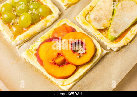 Home made fruit sweet pies before baking Stock Photo