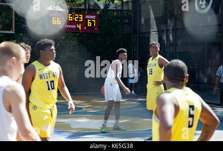 Playing Basketball on West4th street in Greenwich Village, NYC - USA Stock Photo