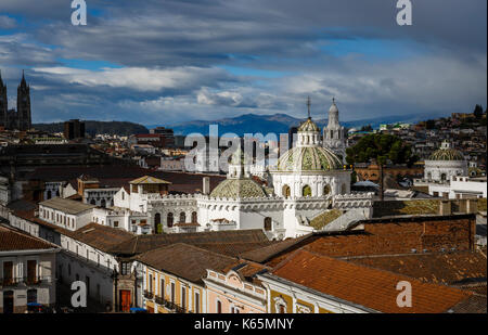The iconic green roof and domes of the Church of the Society of Jesus, or la Compania in the Historic Center, Quito, capital of Ecuador, South America Stock Photo
