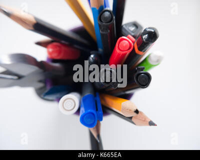 A pot containing stationary items such as pens and pencils, Stock Photo
