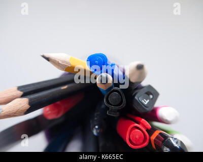 A pot containing stationary items such as pens and pencils, Stock Photo
