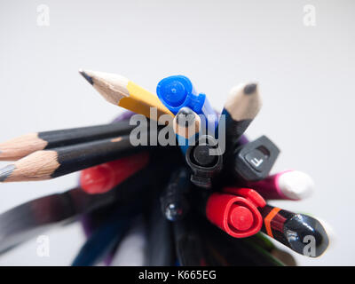 A pot containing stationary items such as pens and pencils, Stock Photo