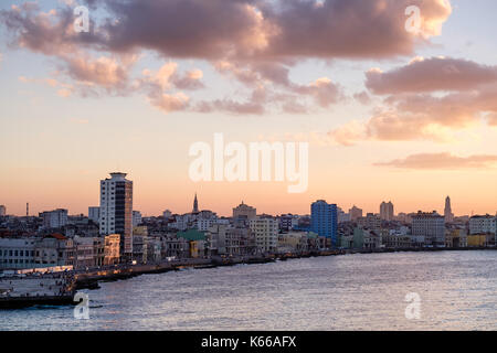 Sunset in Havana with a view of the seaside city skyline and malecon. Cuba. Stock Photo