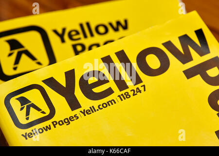 yellow pages classified telephone directory paper edition uk Stock Photo