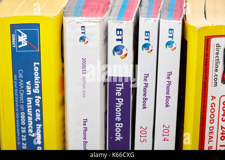 yellow pages classified and bt phone book telephone directory paper edition uk Stock Photo