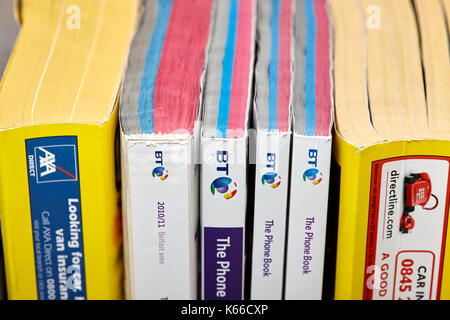 yellow pages classified and bt phone book telephone directory paper edition uk Stock Photo