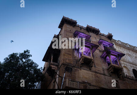 VARANASI, INDIA - CIRCA NOVEMBER 2016: Building over the Ganges river in Varanasi Stock Photo