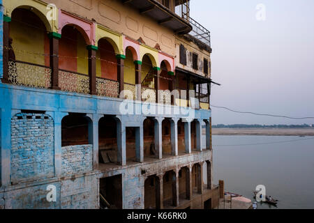 VARANASI, INDIA - CIRCA NOVEMBER 2016: Old building by the Ganges river. The city of Varanasi is the spiritual capital of India, it is the holiest of  Stock Photo