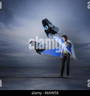 Hovering drones scanning man Stock Photo