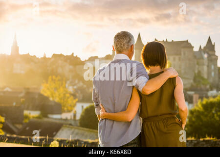 Caucasian couple admiring scenic view Stock Photo