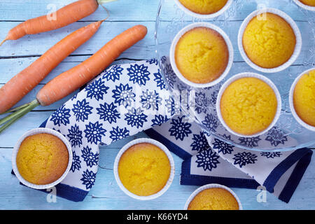Italian muffins called Camilla made with carrot and almonds, top view shot. Stock Photo
