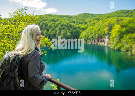 Older Caucasian woman admiring scenic view Stock Photo