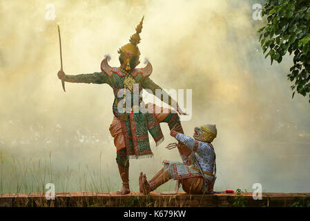 Two masked dancers performing Thai Khon pantomime, Thailand Stock Photo