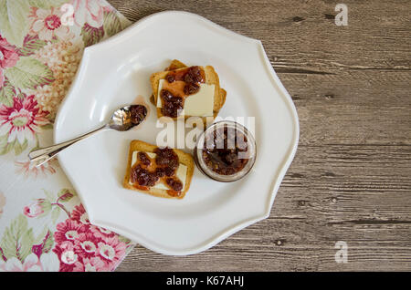 Rusks with butter and strawberry jam Stock Photo