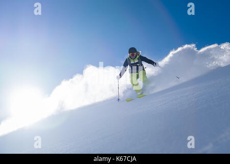 Woman powder skiing, Gastein, Salzburg, Austria Stock Photo