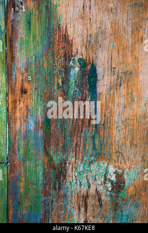 Vertically located colored background boards, painted blue and multi-colored paint, old . Stock Photo