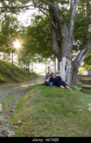the love of man and woman in the park, woman hugging guy Stock Photo ...