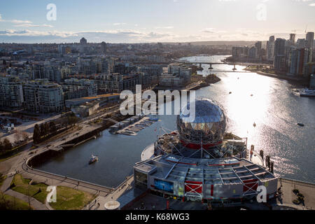 Downtown Vancouver, BC, Canada - Apr 02, 2017 - Aerial View of Science World in False Creek during a sunny evening before sunset. Stock Photo