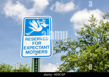 Sign for parking space reserved for expectant mothers or pregnant women Stock Photo