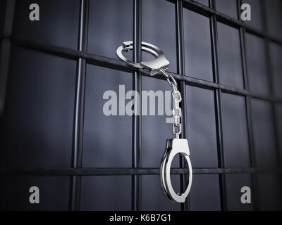 Handcuffs attached to metal prison bars.3D illustration. Stock Photo