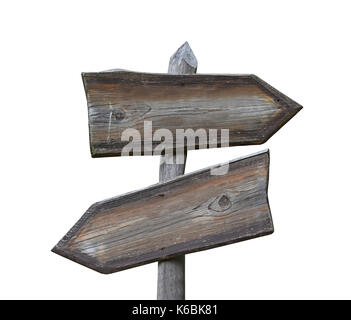 Old vintage road signpost with two wooden planks blank copy space arrows different directions, left down and right, isolated on white, low angle side  Stock Photo