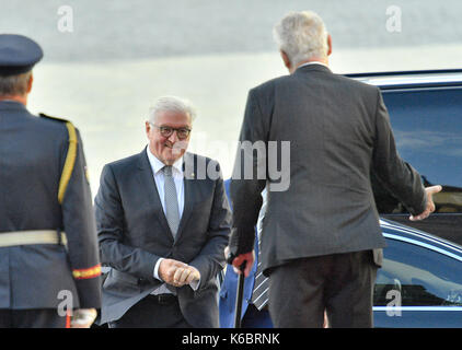 Czech President Milos Zeman, right, welcomes Germany President Frank-Walter Steinmeier, center, in Prague for his first official visit, Tuesday, Sept. Stock Photo