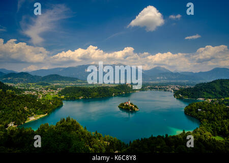 Panoramic aerial view on Lake Bled, Blejsko jezero, and Bled Island, Blejski otok, with the pilgrimage church dedicated to the Assumption of Mary from Stock Photo