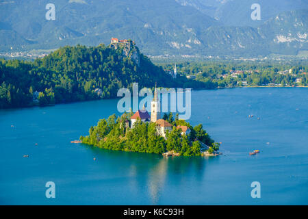 Panoramic aerial view on Lake Bled, Blejsko jezero, and Bled Island, Blejski otok, with the pilgrimage church dedicated to the Assumption of Mary from Stock Photo