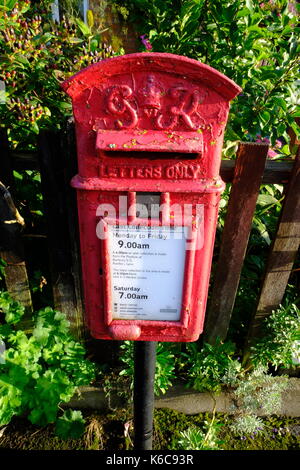 Bunbury, Cheshire, England,Traditional, Red Post Box, Post Office, Mail Box, George Rex, GR, Royal Mail. Stock Photo