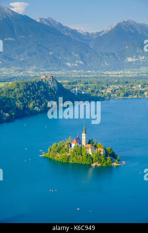 Panoramic aerial view on Lake Bled, Blejsko jezero, and Bled Island, Blejski otok, with the pilgrimage church dedicated to the Assumption of Mary from Stock Photo