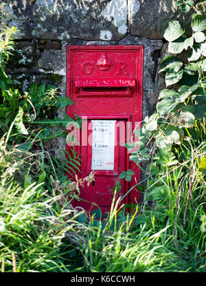 Wall Mounted Post Box with cypher GR for the reign of King George England, near Balfron Strirlingshire. Stock Photo