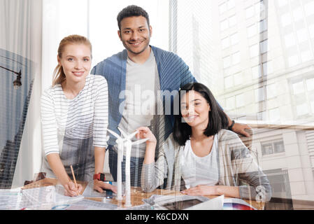 Successful team of young ambitious workers Stock Photo