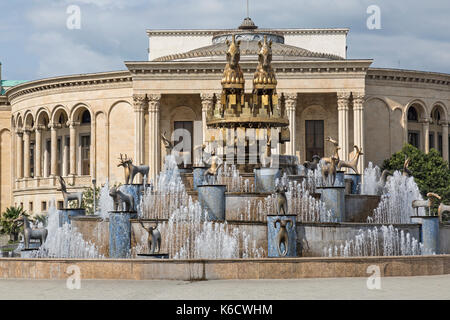 The Colchis Fountain in the centre of Kutaisi in Georgia, with the Georgian Drama Theatre Lado Meskhishvili behind. Stock Photo