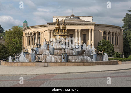 The Colchis Fountain in the centre of Kutaisi in Georgia, with the Georgian Drama Theatre Lado Meskhishvili behind. Stock Photo