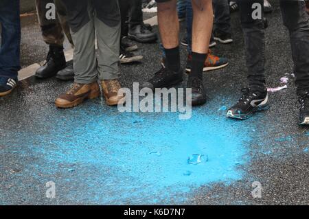 Paris, France. 12th Sep, 2017. A paintbomb is thrown during a Loi Travail march in Paris Credit: Conall Kearney/Alamy Live News Stock Photo
