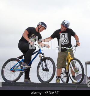 Antics activities thrills and excitement at the Animal Outdoor Clothing promotion stunt cycling display at the annual Windfest Sandbanks Poole UK Stock Photo Alamy