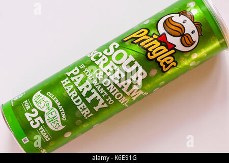 tub of Pringles sour cream & onion, sour screeam & onion if you want to party harder set on white background Stock Photo