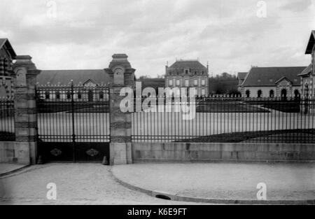 AJAXNETPHOTO. 1891-1910 (APPROX). SAINT-LO, NORMANDY, FRANCE. - LARGE GATED AND FENCED RESIDENTIAL CHATEAU STYLE PROPERTY WITH OUTBUILDINGS. THE HARAS NATIONAL DE SAINT-LO,  HORSE BREEDING AND TRAINING STUD BUILT IN 1886.PHOTOGRAPHER:UNKNOWN © DIGITAL IMAGE COPYRIGHT AJAX VINTAGE PICTURE LIBRARY SOURCE: AJAX VINTAGE PICTURE LIBRARY COLLECTION REF:AVL FRA 1890 09 Stock Photo