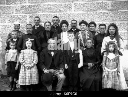 AJAXNETPHOTO. 1891-1910 (APPROX). SAINT-LO REGION, NORMANDY. FRANCE. - A LARGE GROUP PHOTO POSSIBLY INCLUDING A FAMILY AND SERVANTS. PHOTOGRAPHER:UNKNOWN © DIGITAL IMAGE COPYRIGHT AJAX VINTAGE PICTURE LIBRARY SOURCE: AJAX VINTAGE PICTURE LIBRARY COLLECTION REF:AVL FRA 1890 11 Stock Photo