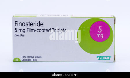 Finasteride is used to treat enlarged prostrate.  It prevents the conversion of testosterone to dihydrotestosterone (DHT) Stock Photo
