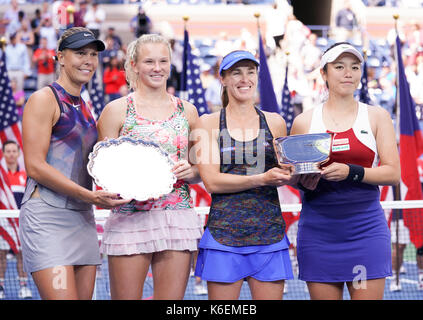 New York, NY USA - September 10, 2017: Martina Hingis of Switzerland & Yung-Jan Chan of Chinese Taipei & Lucie Hradecka & Katerina Siniakova of Czech Republic with trophies at US Open Championships at Billie Jean King National Tennis Center Stock Photo