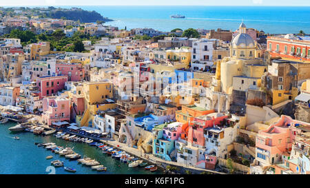 Panoramic view of the old village of fishermen's houses and the marina of Corricella, a classic panoramic view of the island of Procida, Italy.