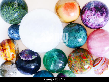 Set of natural mineral stones of mixed colors as polished sphere balls including fluorite, agate, quartz, jasper Stock Photo
