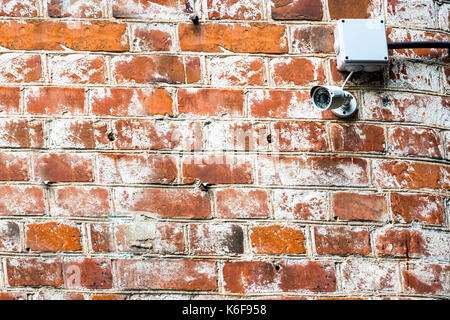 Security camera on the wall Stock Photo