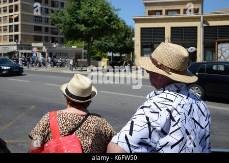 Couple Waiting for Bus in Aix-en-Provence Provence France Stock Photo