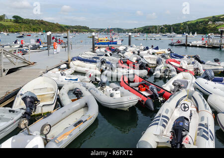 Small RIBs and inflatable boats moored at Whitestrand Pontoon in Salcombe, Devon Stock Photo